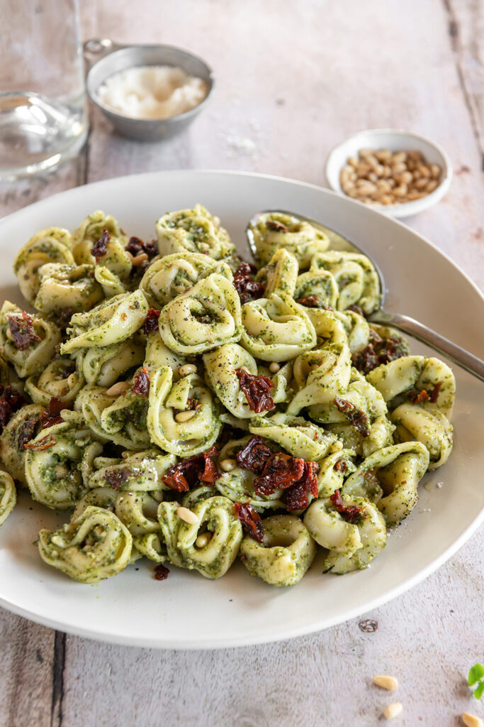 Pesto & Sun-dried Tomato Tortellini Salad with Toasted Pine Nuts